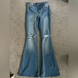 hollister high-rise ripped medium wash flare jeans